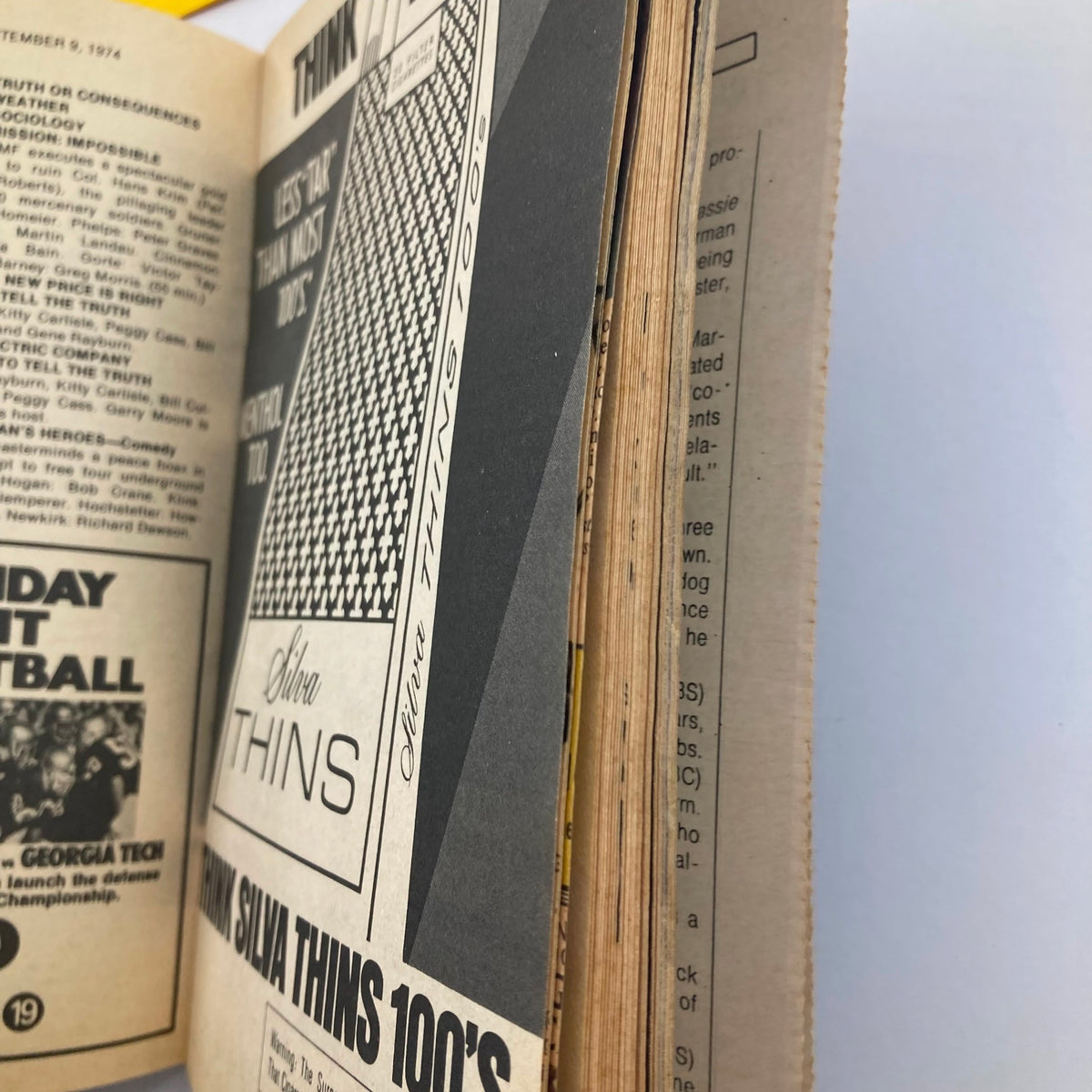 Side view of TV Guide Magazine September 7 1974 #1119 showing the spine and pages, illustrating its vintage condition. Perfect for antique magazine collectors.