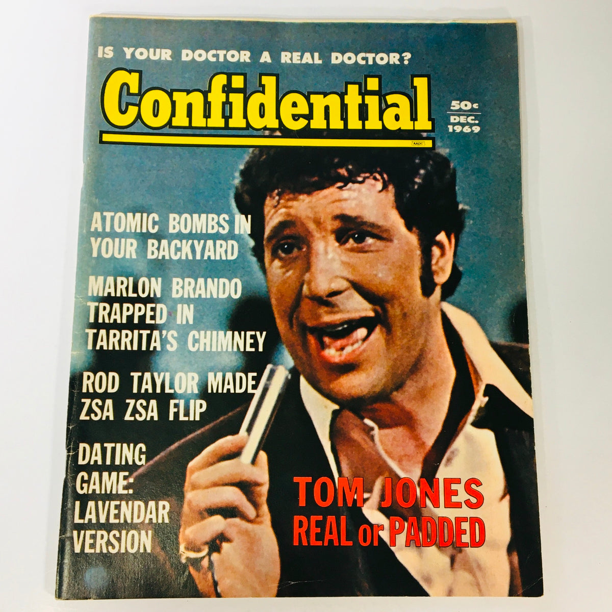 Cover of VTG Confidential Magazine December 1969, featuring Tom Jones and Marlon Brando, discussing the question 'Real or Padded'.
