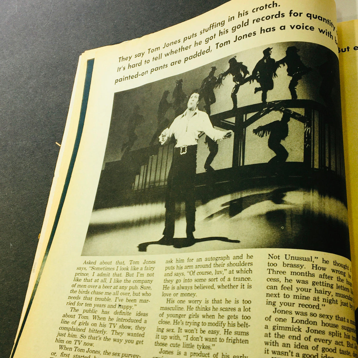Image from VTG Confidential Magazine December 1969 featuring Tom Jones performing on stage, discussing the rumor of his padded pants.