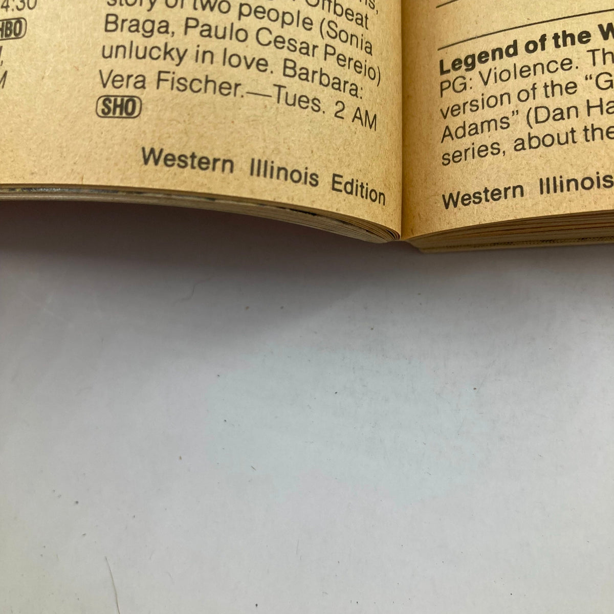 Interior page of TV Guide Magazine October 8 1983 featuring show listings and descriptions. This edition highlights Willie Nelson on the cover, showcasing Western Illinois Edition programming for that week.