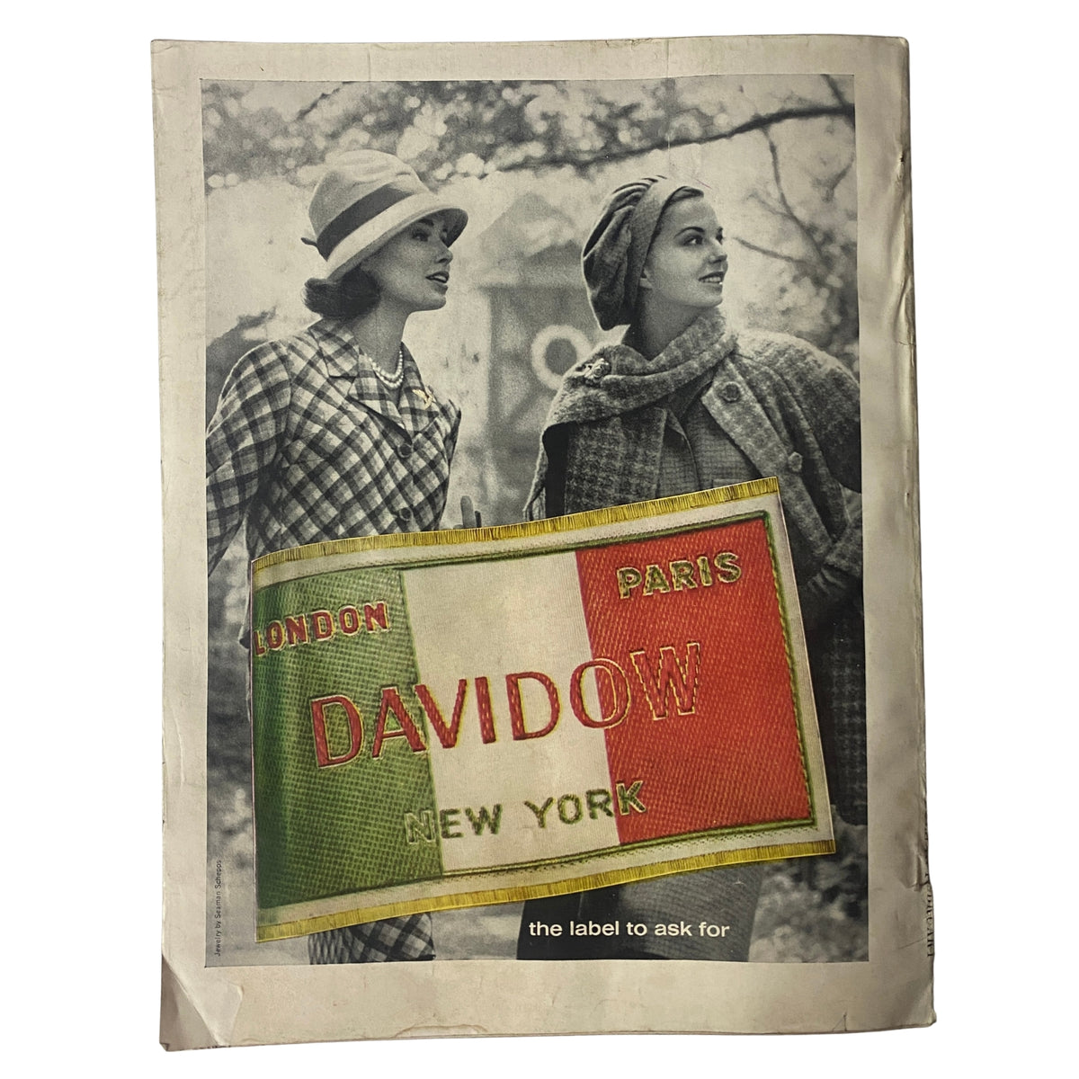 Vogue Magazine February 1, 1962 cover featuring two women in stylish hats and coats, showcasing a fashion advertisement for Davidow with the text 'the label to ask for', representing early 1960s fashion trends.