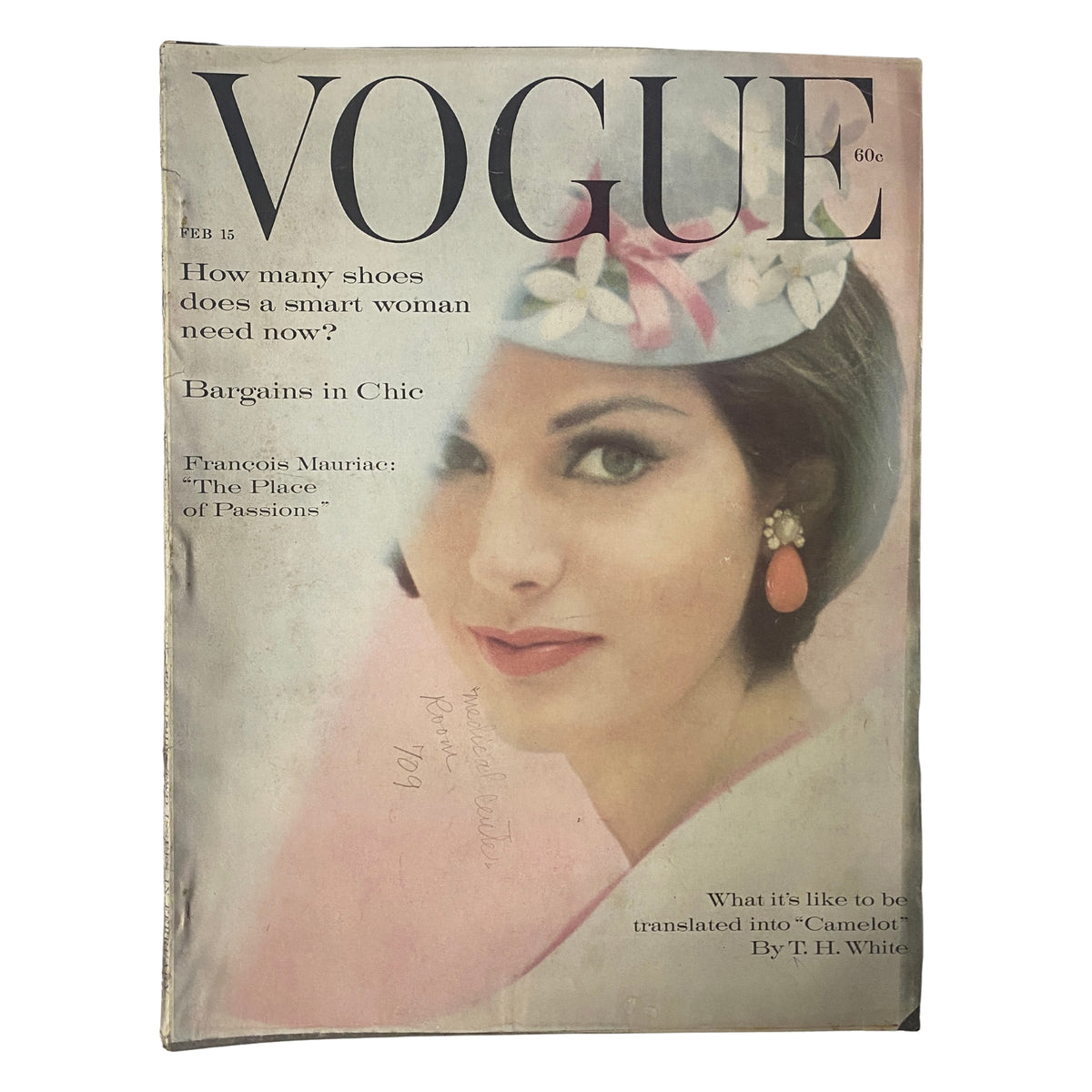 Vogue Magazine February 15, 1961 featuring Pia Rossilli Kazan on the cover, showcasing elegant fashion details alongside a question about smart women's shoe needs.