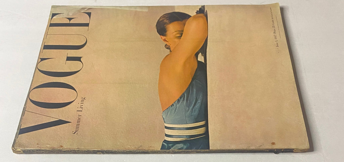 Vogue Magazine June 1, 1947 cover with a model in a sleeveless summer outfit, highlighting the essence of summer fashion from the era, captured by John Rawlings.