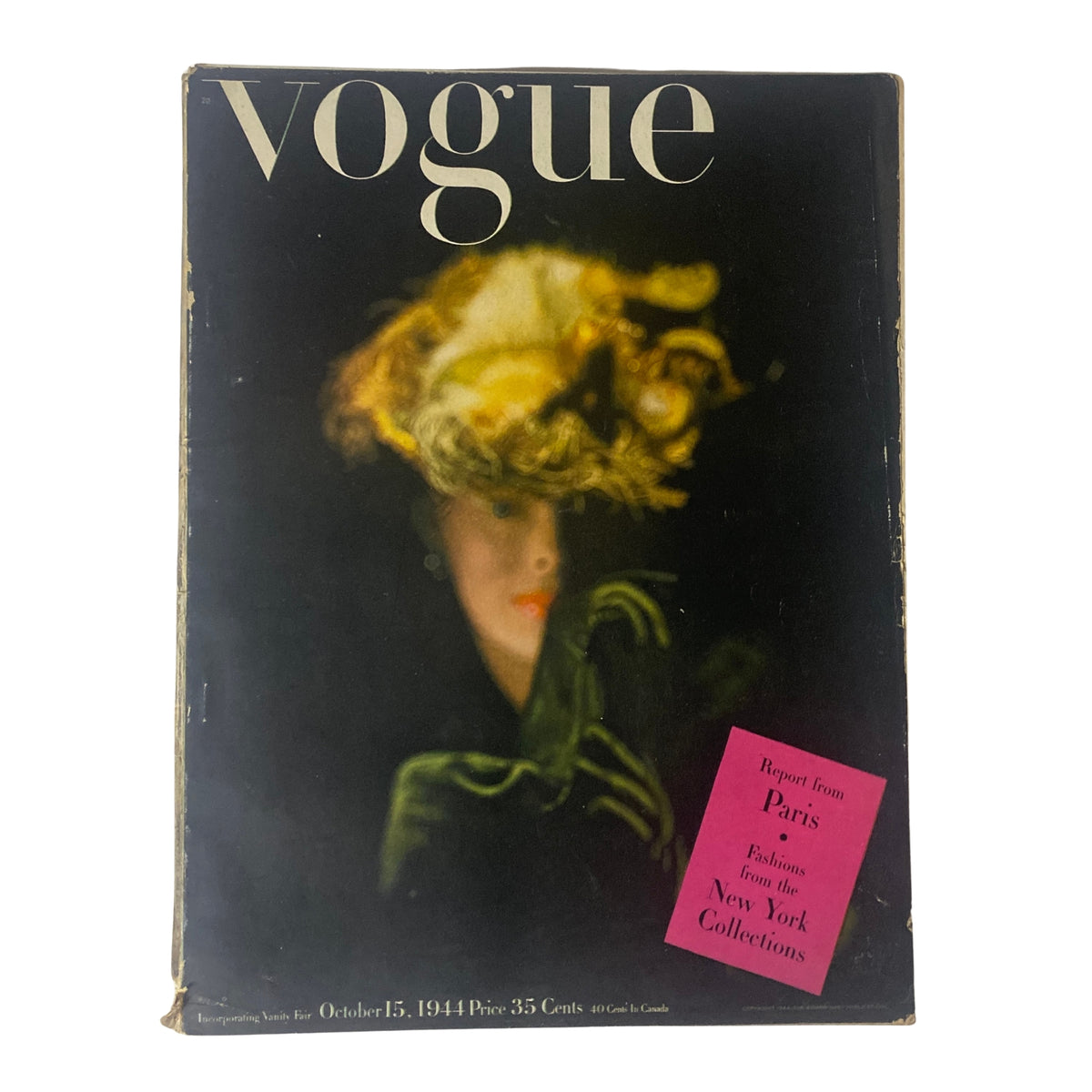 Vogue Magazine cover from October 15, 1944 featuring Meg Mundy, photographed by John Rawlings, depicting a woman in a dark setting with a prominent flower hat. This historic issue highlights Europe’s liberation during World War II.