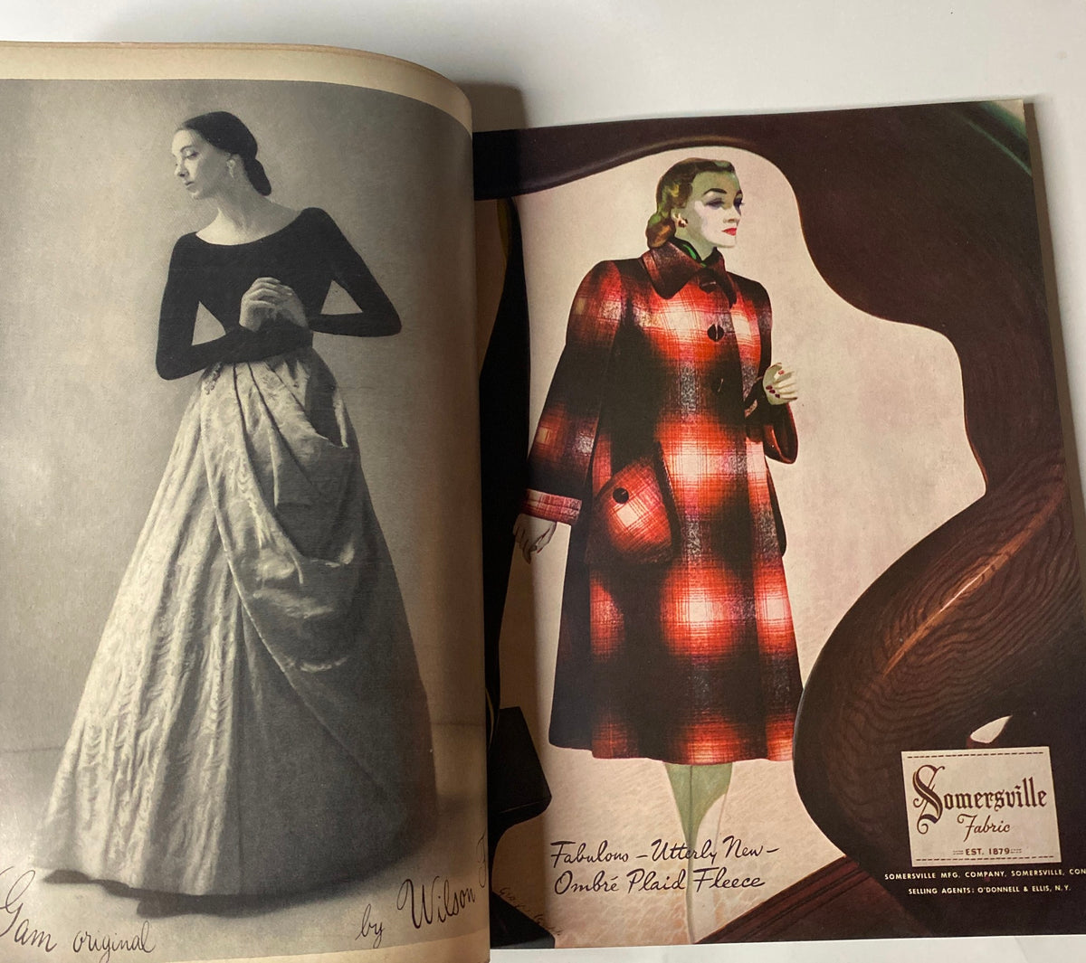 Fashion spread in Vogue Magazine September 15, 1947, showcasing elegant clothing designs by Wilhelmina and Somersville Studio, reflecting mid-century style.