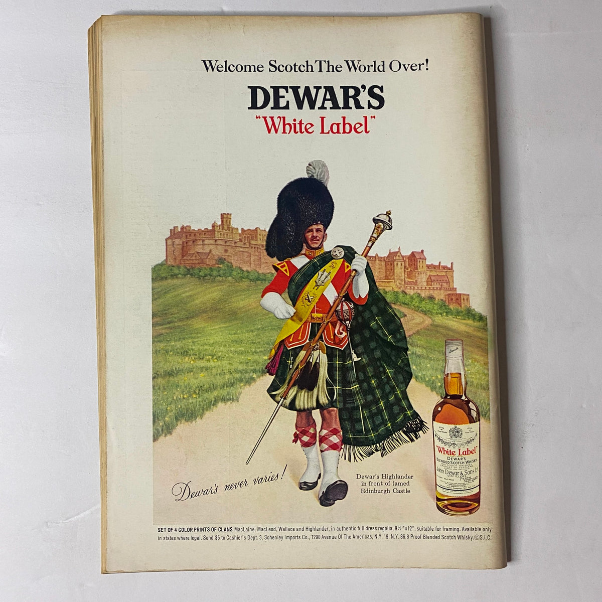 Advertisement for Dewar's White Label from The New Yorker Full Magazine April 26, 1969, featuring a Scottish soldier in traditional attire against a scenic backdrop, highlighting vintage marketing art and brand heritage.