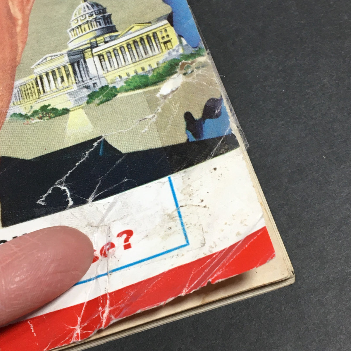 Close-up of the VTG Newsweek Magazine May 9 1960 showing the wear and tear on the cover along with a finger pointing to the illustration.