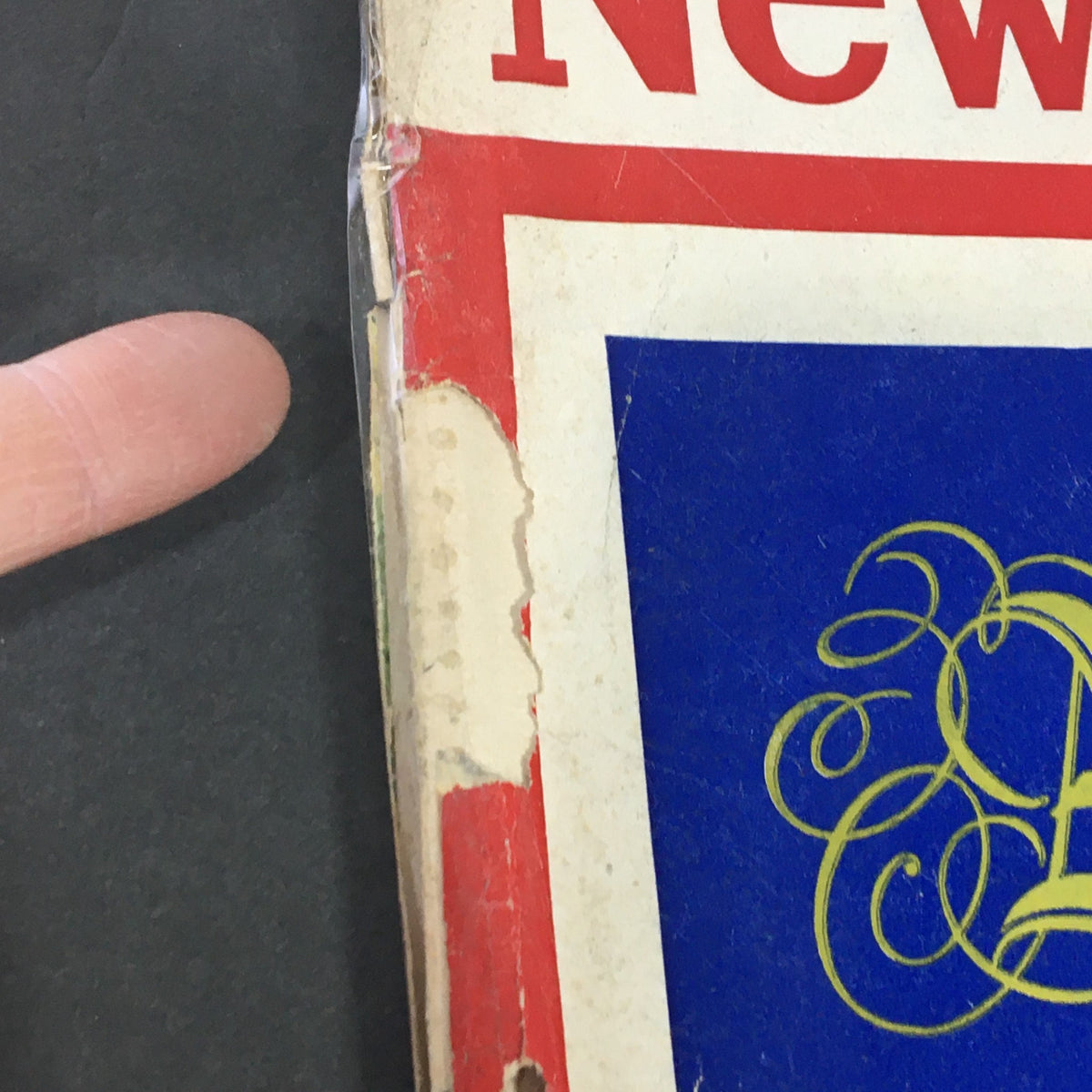 Side view of VTG Newsweek Magazine December 23, 1957, illustrating the wear and tear adding to its vintage appeal.