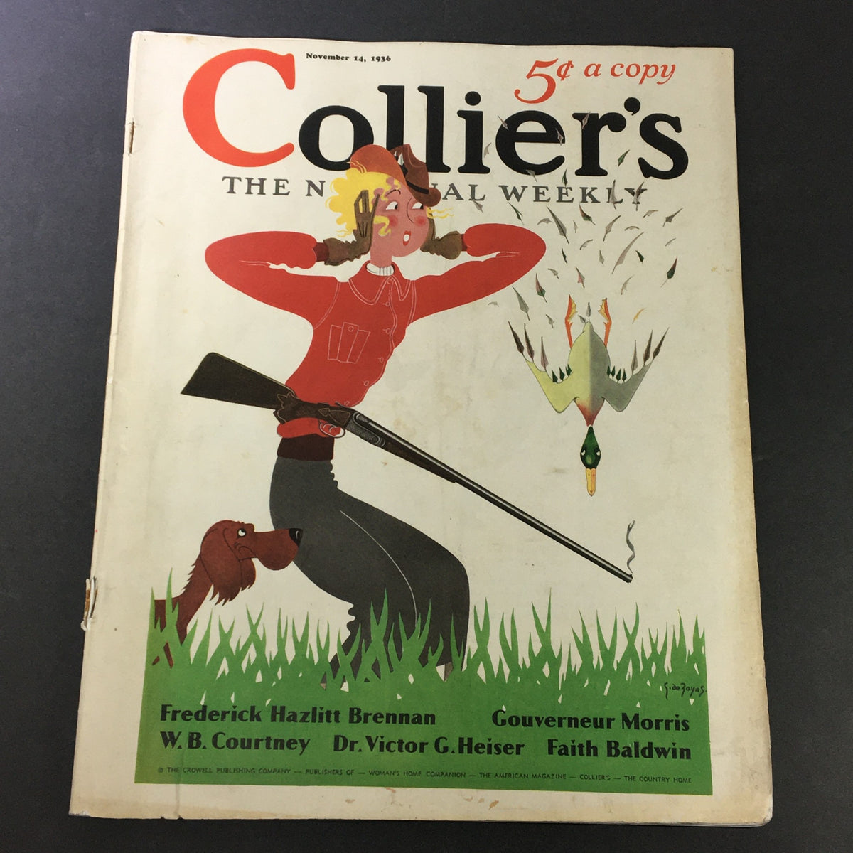 Cover of VTG Collier's Magazine from November 14, 1936, featuring vibrant artwork of a woman aiming a shotgun, with a dog in the grass and a flying duck, showcasing historical design and graphics.