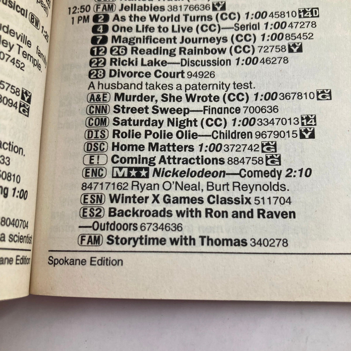 Interior page of TV Guide Magazine January 1, 2000 showcasing TV listings, including shows like 'Murder, She Wrote' and 'Storytime with Thomas', from the Spokane Edition.