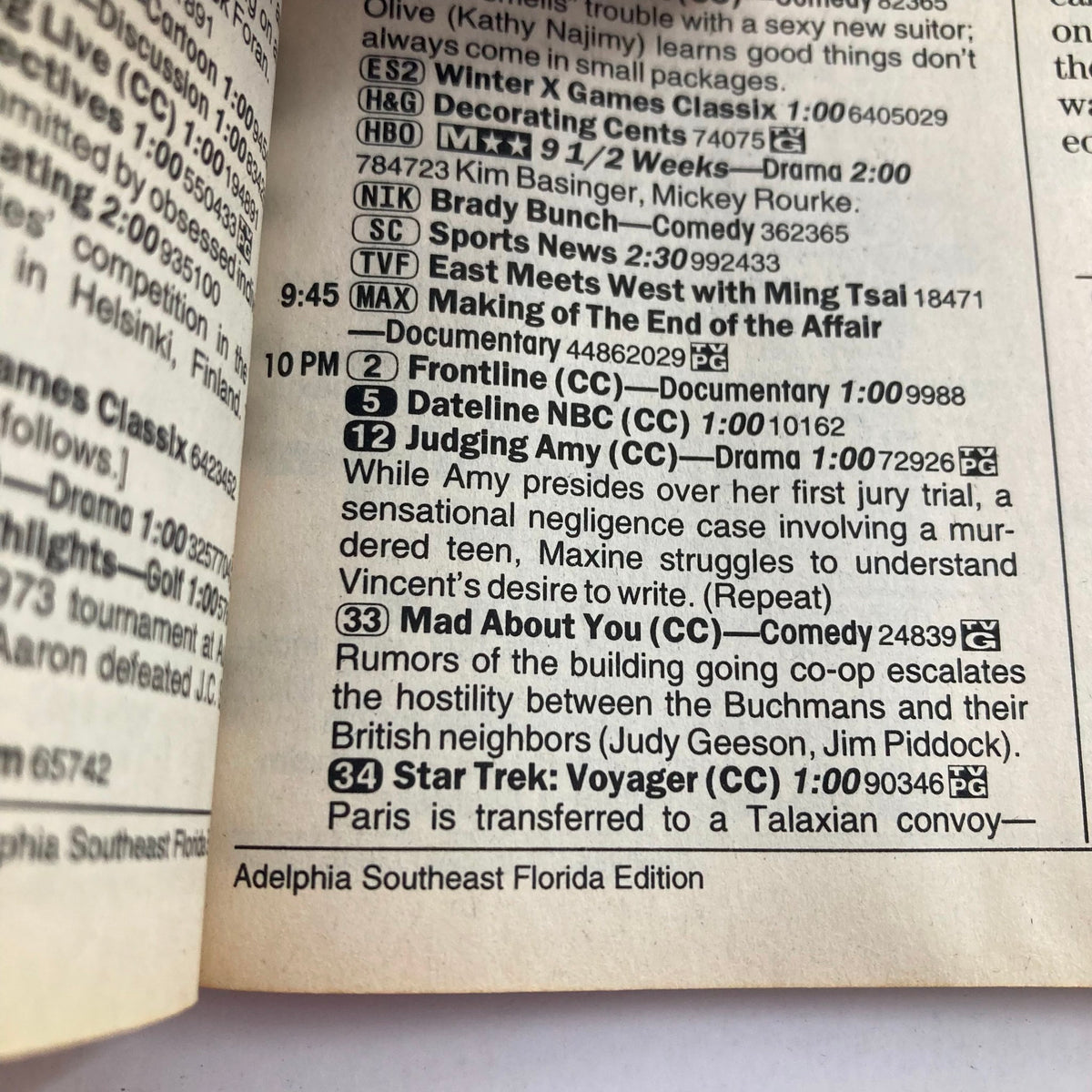Interior page of TV Guide Magazine January 1, 2000, showcasing the TV schedule including shows like Frontline and Star Trek: Voyager. This page provides programming details for Adelphia Southeast Florida Edition.