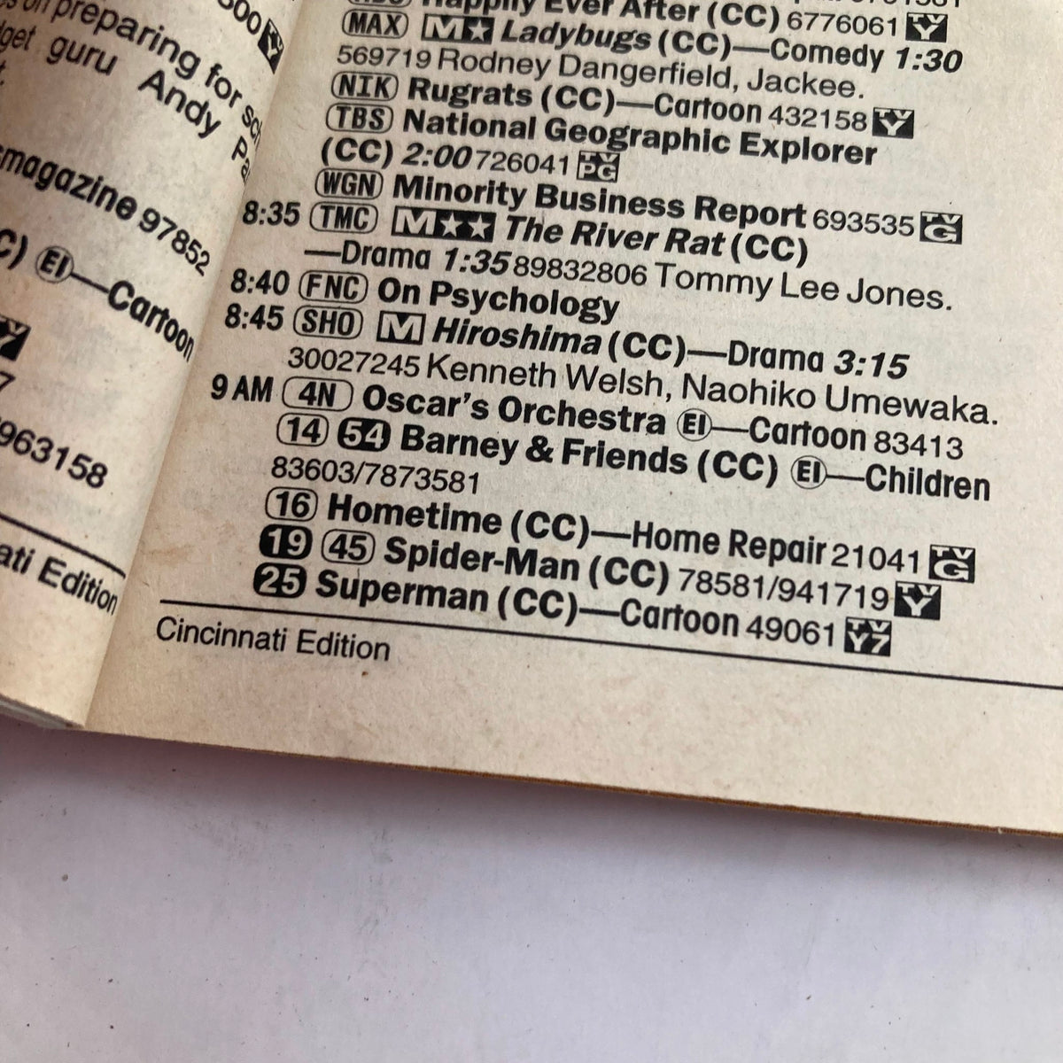 Interior view of TV Guide Magazine from August 16, 1997. Features Cincinnati Edition programming listings, showcasing various TV shows including 'Barney & Friends' and 'Spider-Man'.