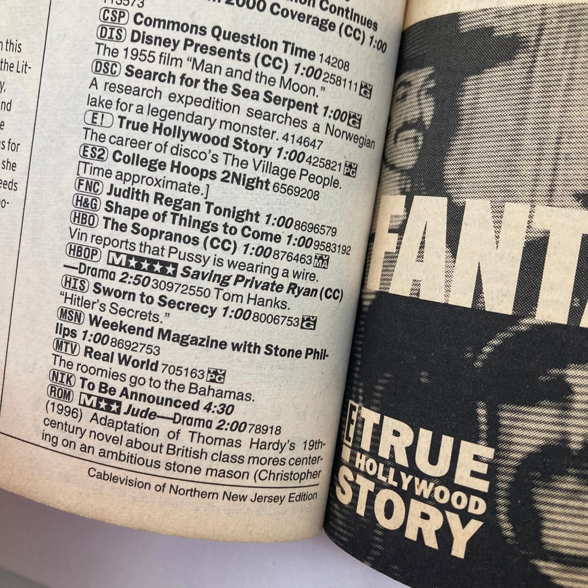 Inside page of TV Guide Magazine January 1, 2000 showing television listings and 'True Hollywood Story' features.
