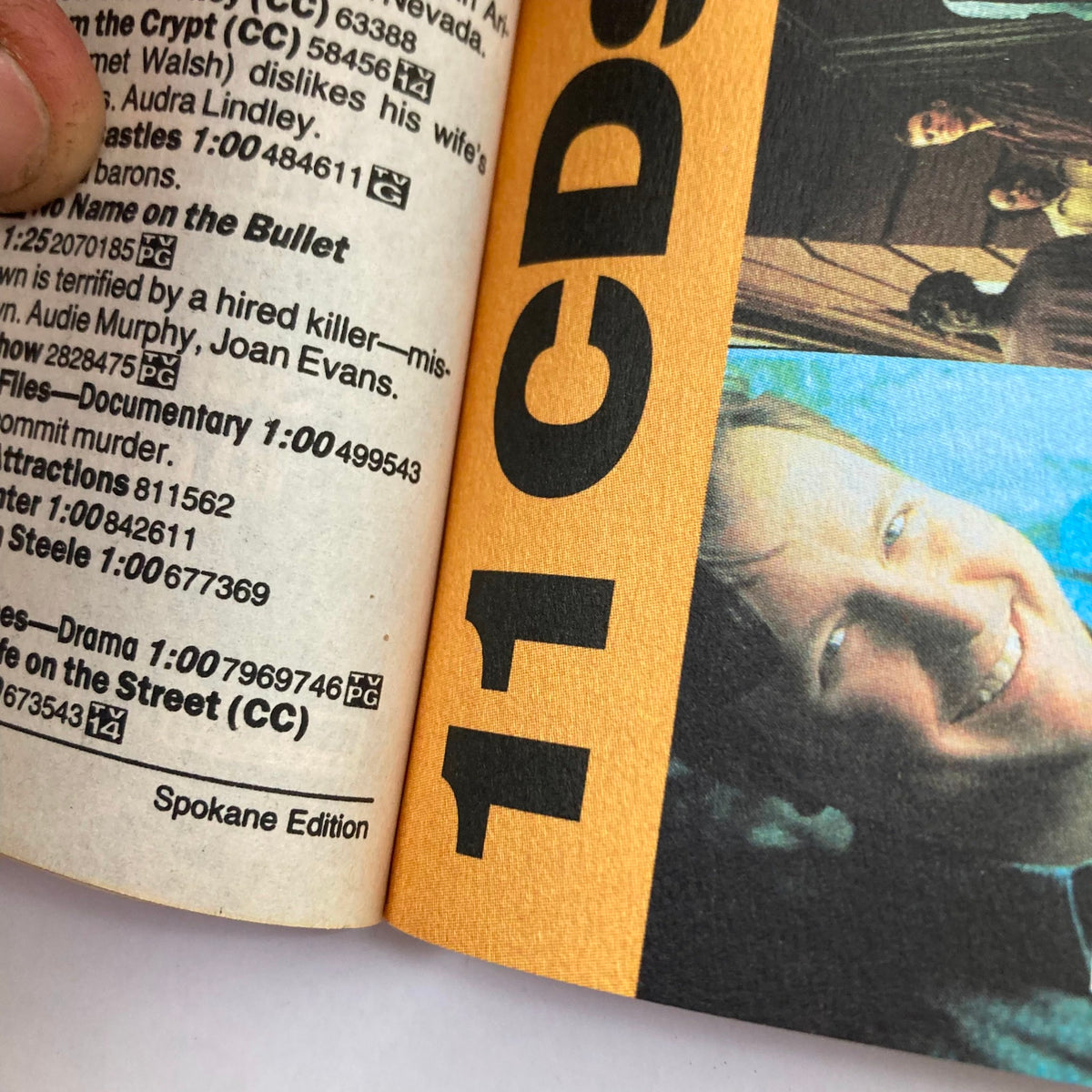 Inside view of TV Guide Magazine August 16 1997 featuring listings and Spokane Edition details. This image highlights a page showing movie and documentary titles with accompanying ratings and information.