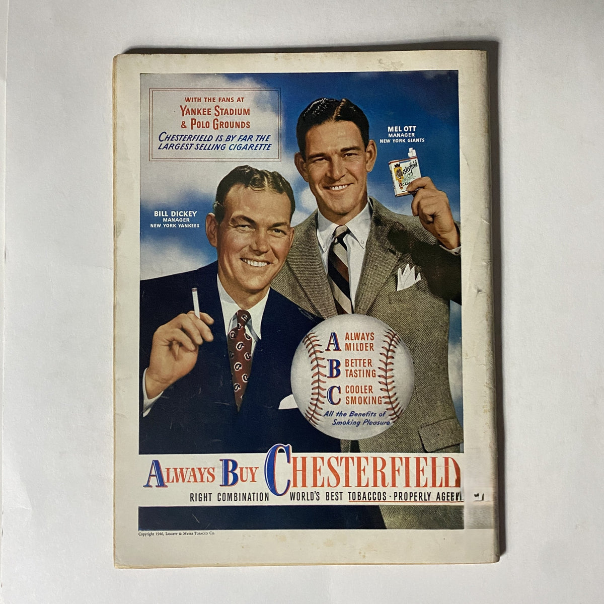 Advertisement for Chesterfield Cigarettes featuring Bill Dickey and Mel Ott, highlighting the message 'Always Buy Chesterfield' with images of the two baseball managers.