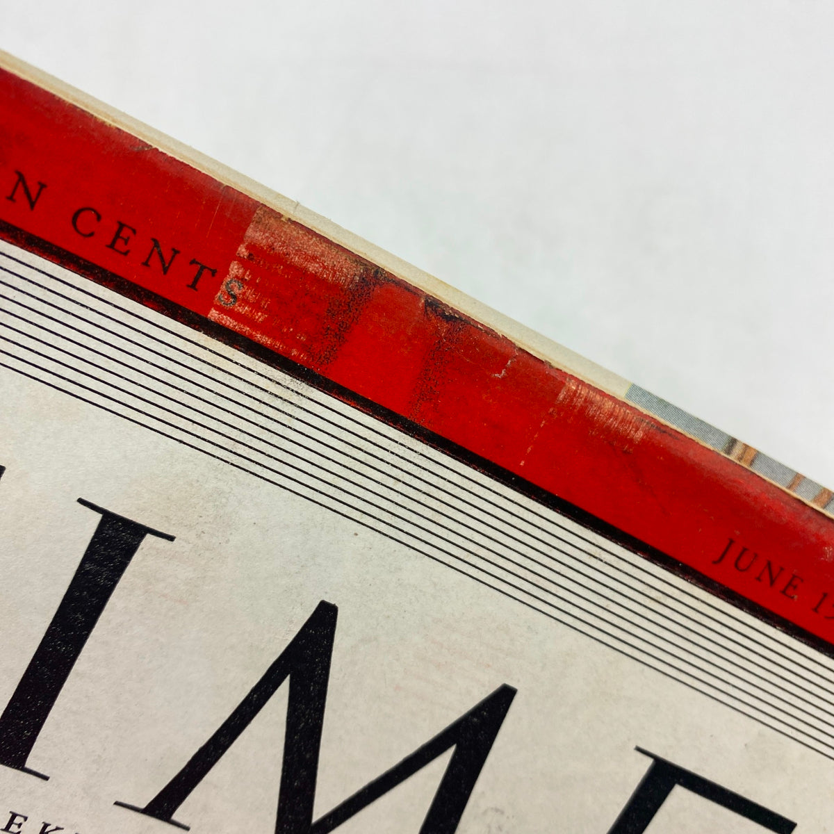 Close-up view of the top edge of Time Magazine, June 15, 1942, Volume 39, Number 24, showing vintage wear with a portion of the cover title visible.
