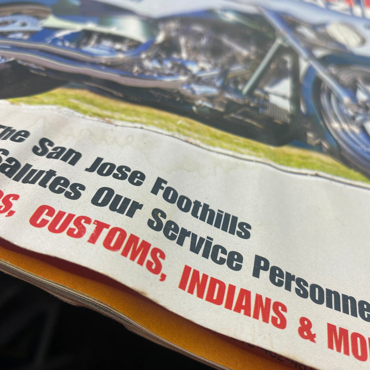 Close-up of American Iron Magazine October 2002 showing promotional text mentioning San Jose Foothills and services for customs, Indians, and motorcycles.
