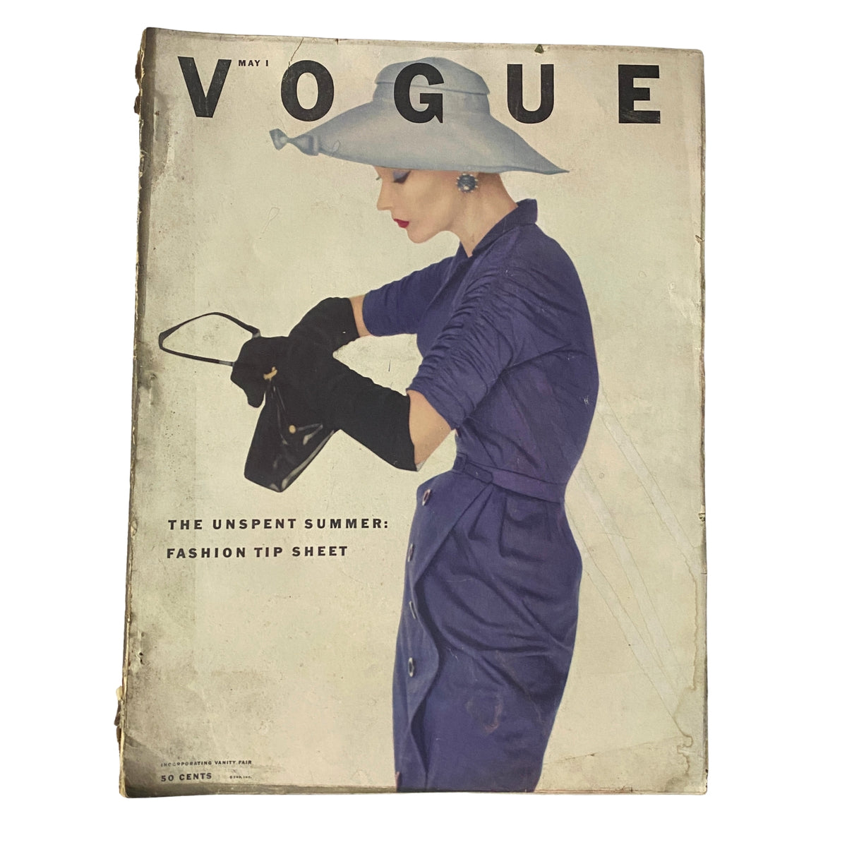 Vogue Magazine May 1, 1952 cover featuring Lisa Fonssagrives, photographed by Irving Penn. The cover highlights 1950s fashion with a focus on elegance.