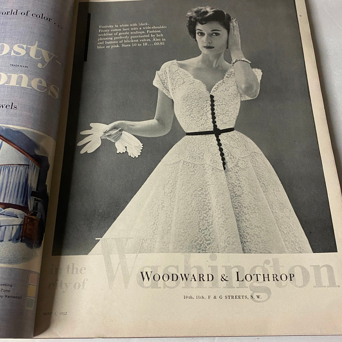 Fashion advertisement for Woodward & Lothrop featuring an elegant dress from Vogue Magazine May 1, 1952.