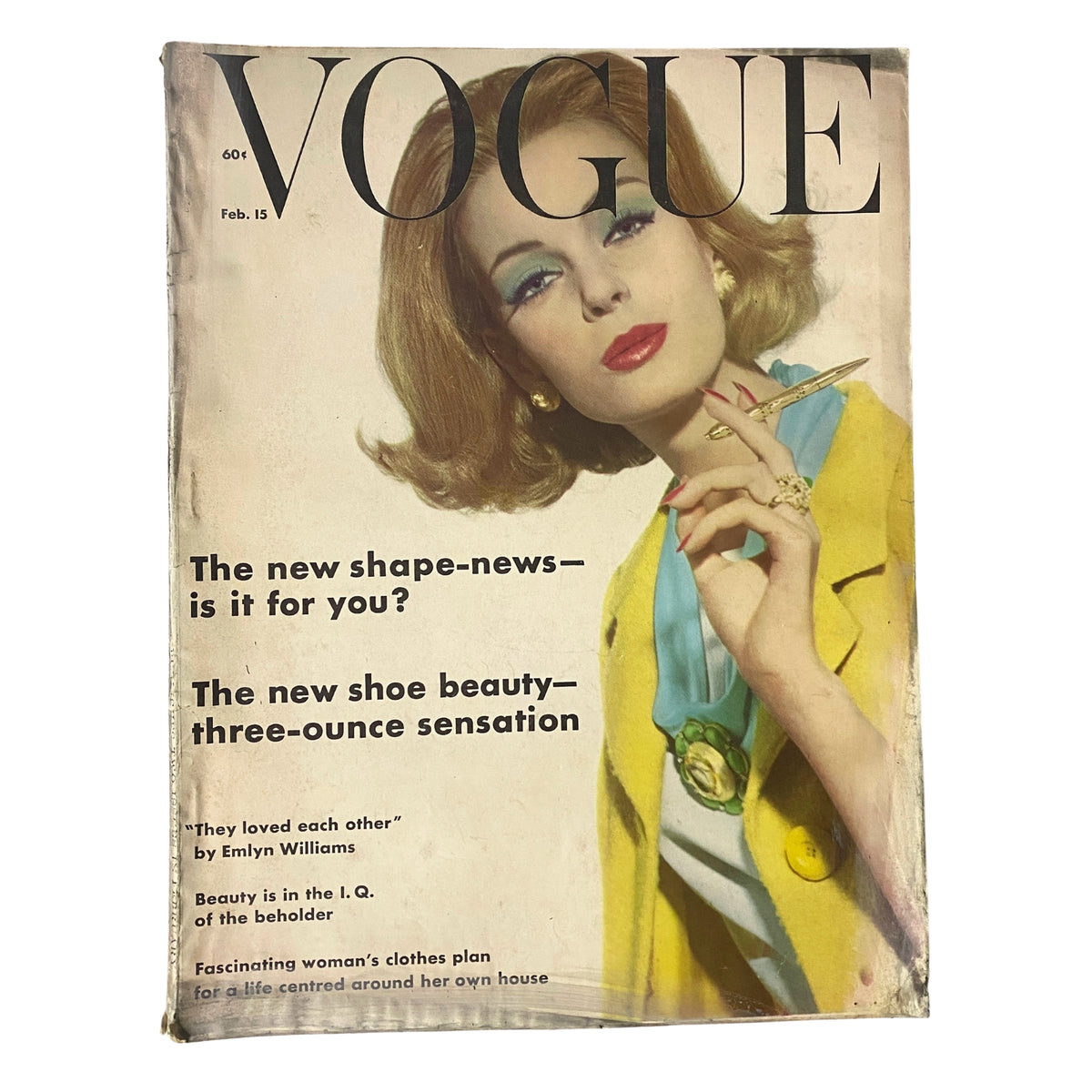Vogue Magazine cover for February 15, 1962 featuring Nena von Schlebrügge, photographed by Tom Palumbo, showcasing early 1960s fashion, with a focus on beauty and modern silhouettes.