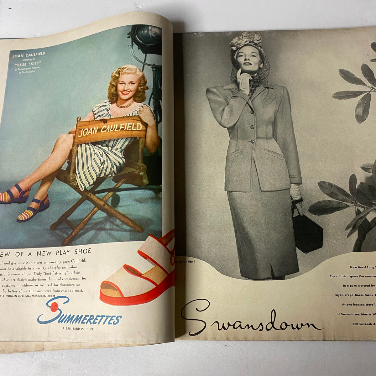 Vogue Magazine December 15, 1946 featuring Joan Caulfield promoting play shoes 'Swimmerettes'. Classic vintage fashion showcasing 1940s style with a focus on footwear and elegance in a playful setting.