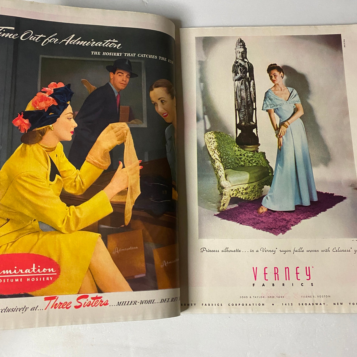 Vogue Magazine December 15, 1946 with an advertisement for 'Three Sisters' hosiery. Highlights a stylish fashion scene of women admiring each other's attire, illustrating the elegance of mid-20th century fashion.