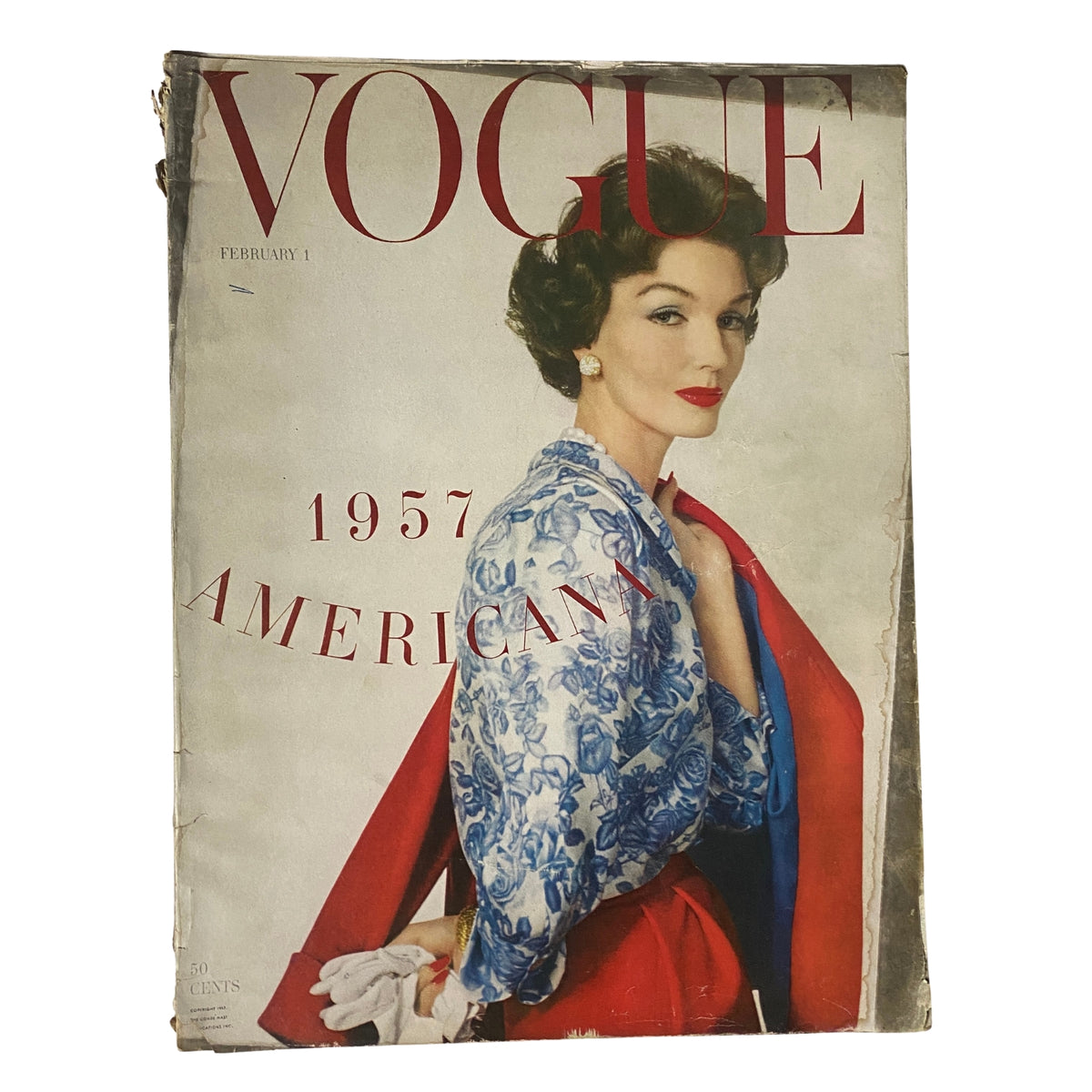 Vogue Magazine February 1, 1957 featuring Joanna McCormick on the cover, photographed by Irving Penn. The cover showcases a vibrant fashion aesthetic typical of mid-century style, highlighting the theme of Americana.