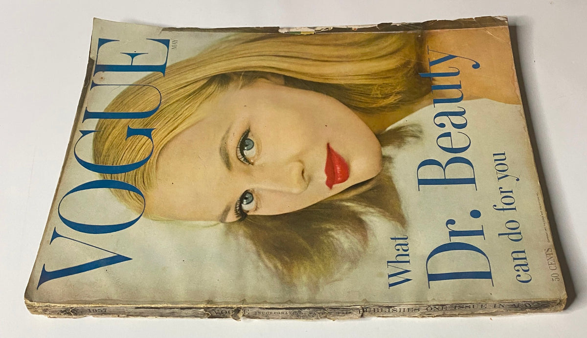 Vogue Magazine May 1957 cover displaying Ann Klem's portrait, emphasizing beauty with the caption 'What Dr. Beauty can do for you'.