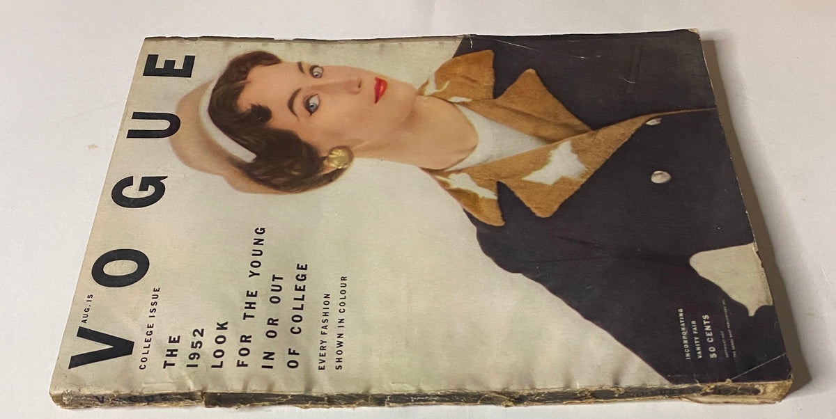 Vogue Magazine August 15, 1952, featuring Ruth Neumann on the cover, showcasing a classic early-1950s design for the College Issue.