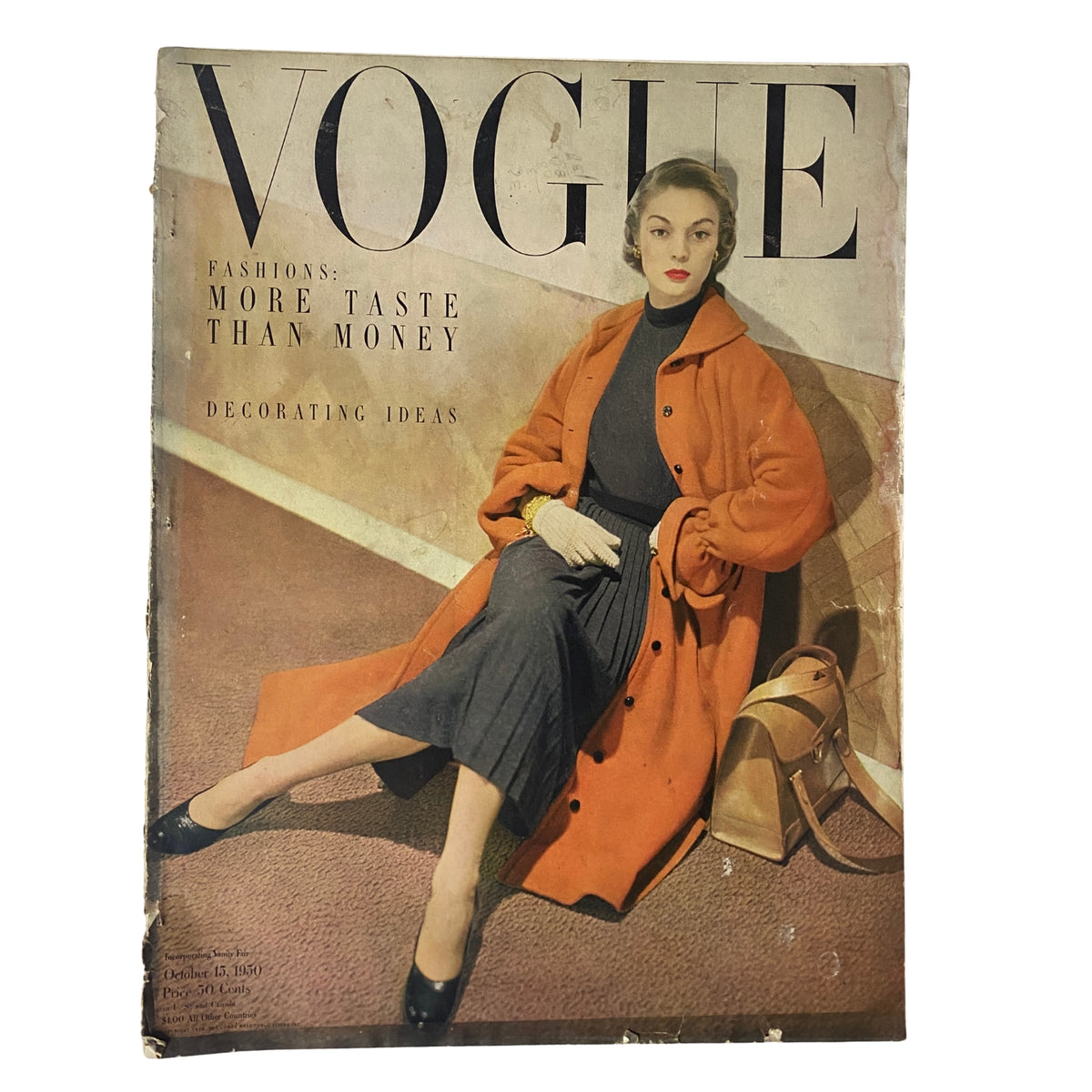 Cover of Vogue Magazine October 15, 1950 featuring model Jean Patchett in an elegant orange coat, showcasing fashion themes of 'More Taste Than Money' and decorative ideas.