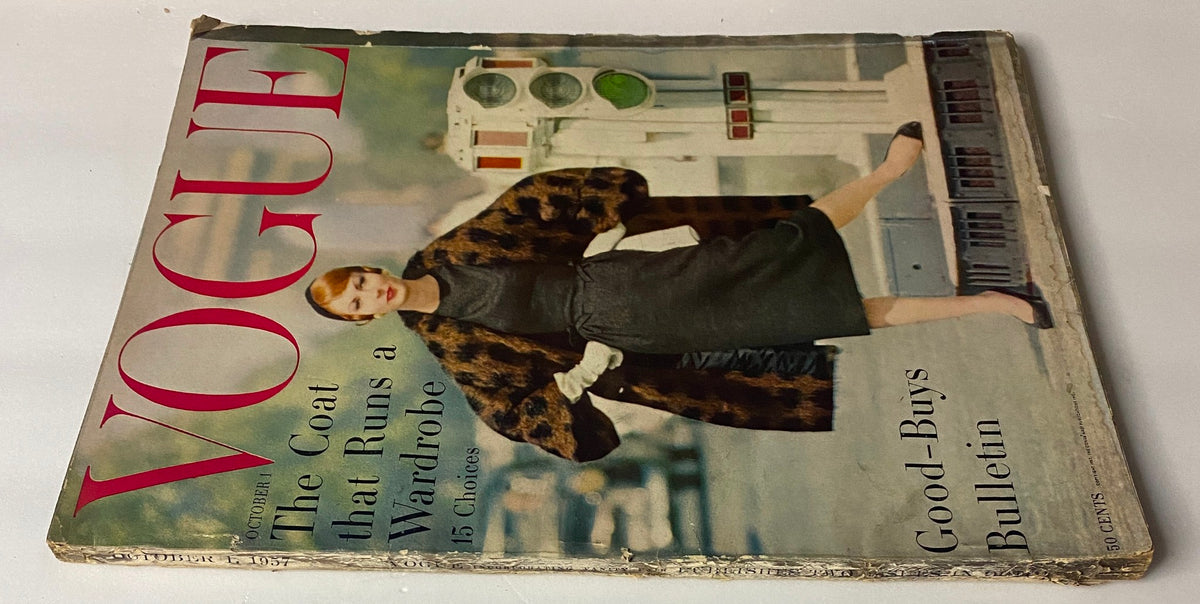 Cover of Vogue Magazine October 1, 1957 featuring Mary McLaughlin, photographed by William Klein, showcasing a stylish model in a chic coat.