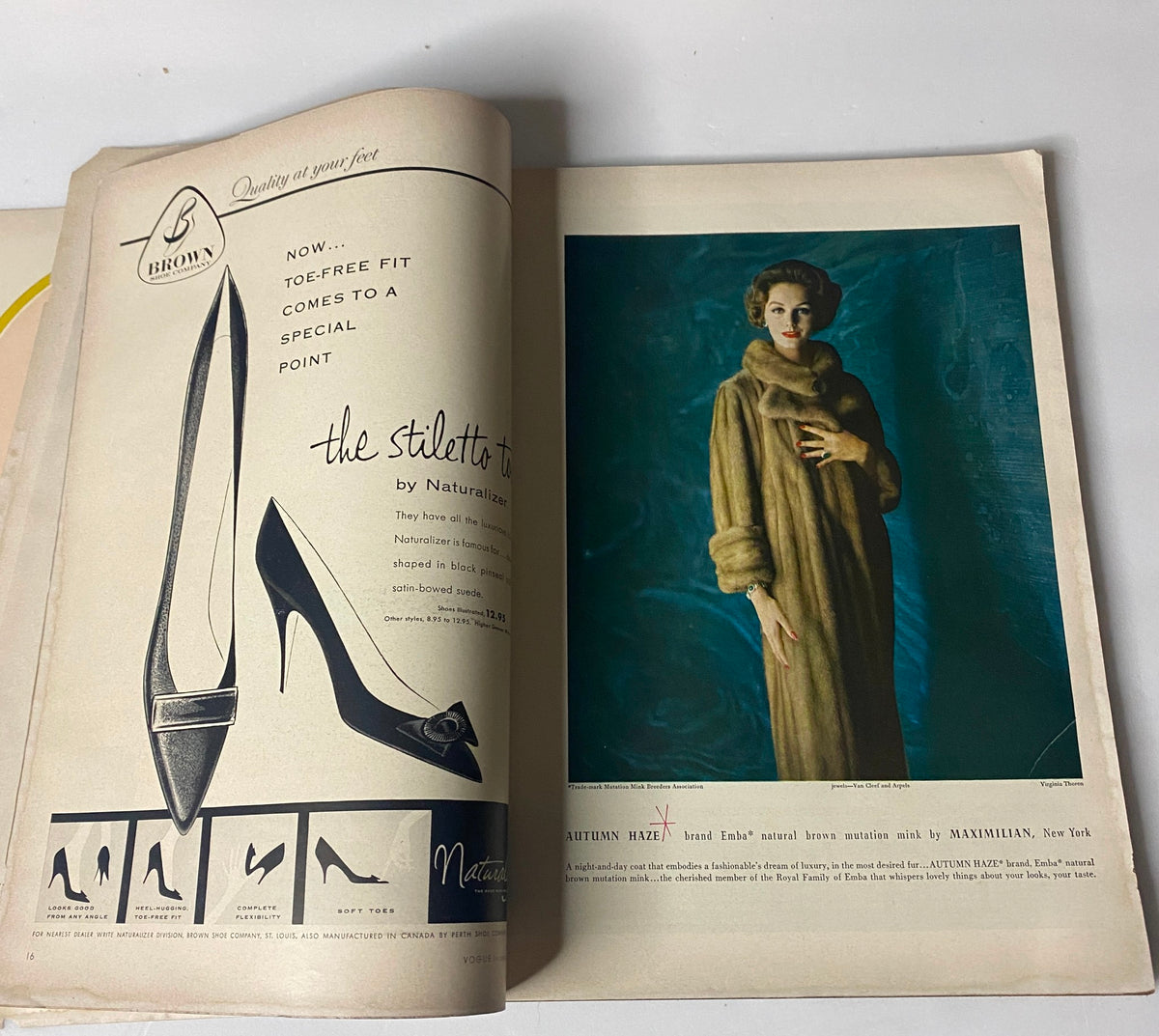 Interior page of Vogue Magazine October 1, 1957, displaying an advertisement for stylish shoes and a model wearing luxurious fur.