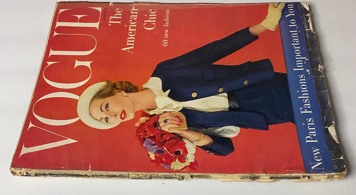 Vogue Magazine March 15, 1957 featuring The American Chic cover, highlighting a fashionable woman adorned in a navy blazer, symbolizing elegance in vintage fashion.