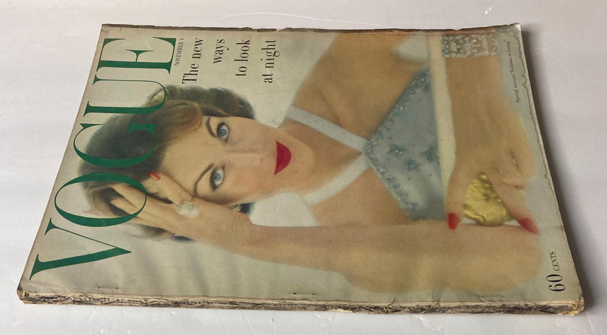 Another view of Vogue Magazine November 1, 1957, displaying Va Taylor on the cover, highlighting the theme 'The new ways to look at night'.