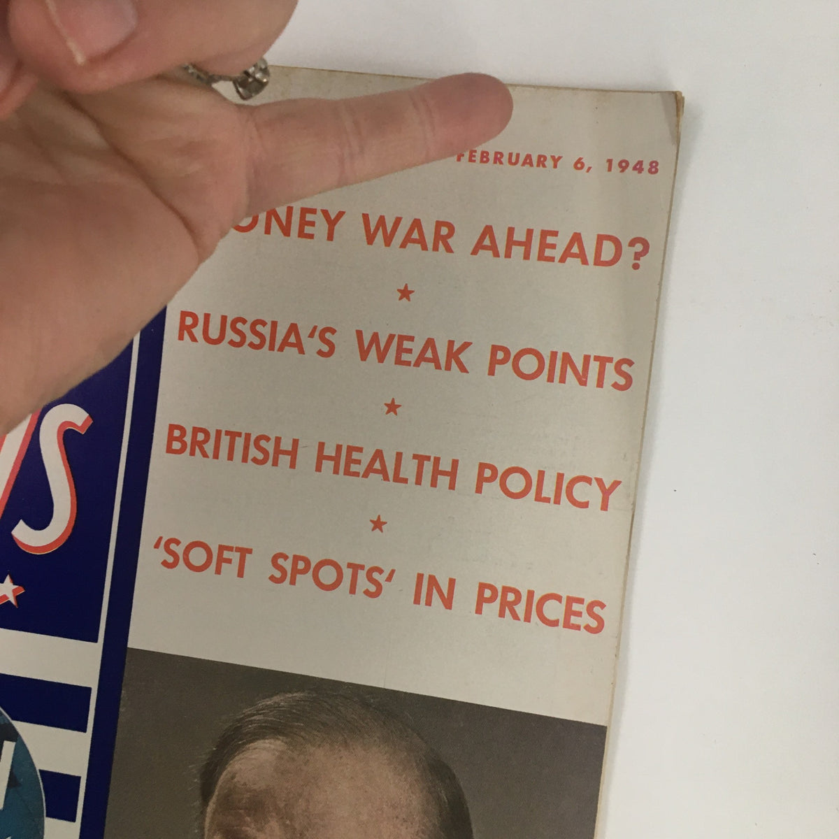 Detailed view of the cover of the VTG U.S. News & World Report, February 6, 1948, highlighting articles on global issues with a focus on Canada Premier Mackenzie King.