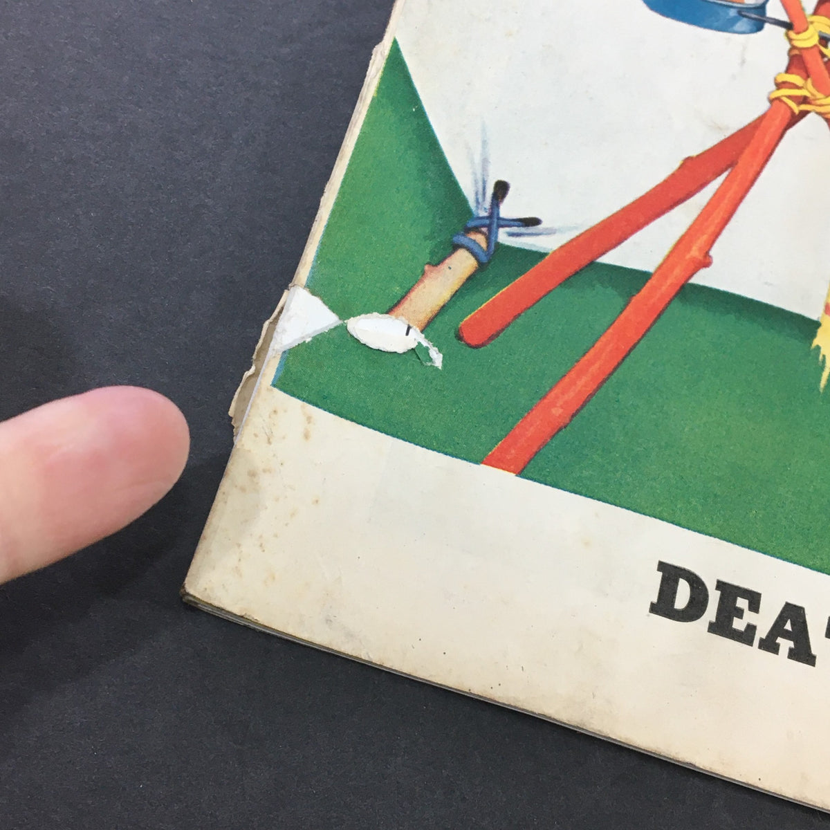 Side view of VTG Collier's Magazine from November 8, 1941, highlighting the title 'Death of a Dutch Town' by Pierre van Paassen along with visible signs of wear and tear on the edges.