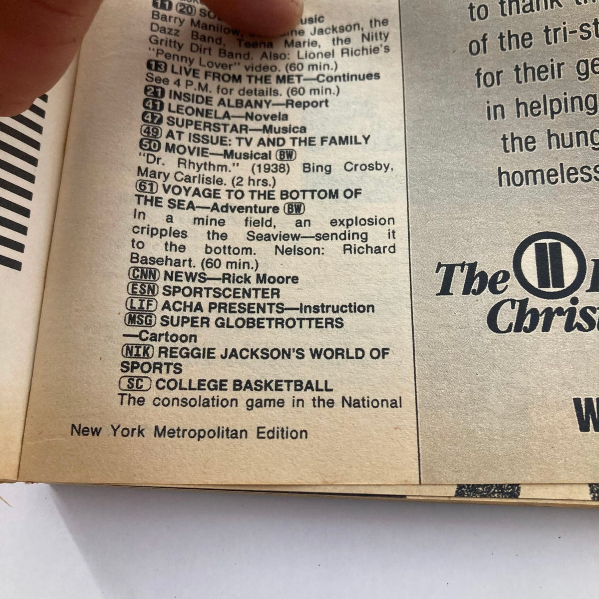 Inside page of TV Guide Magazine January 5, 1985 showing programming listings and features for the New York Metropolitan Edition. Highlights various shows of the era.