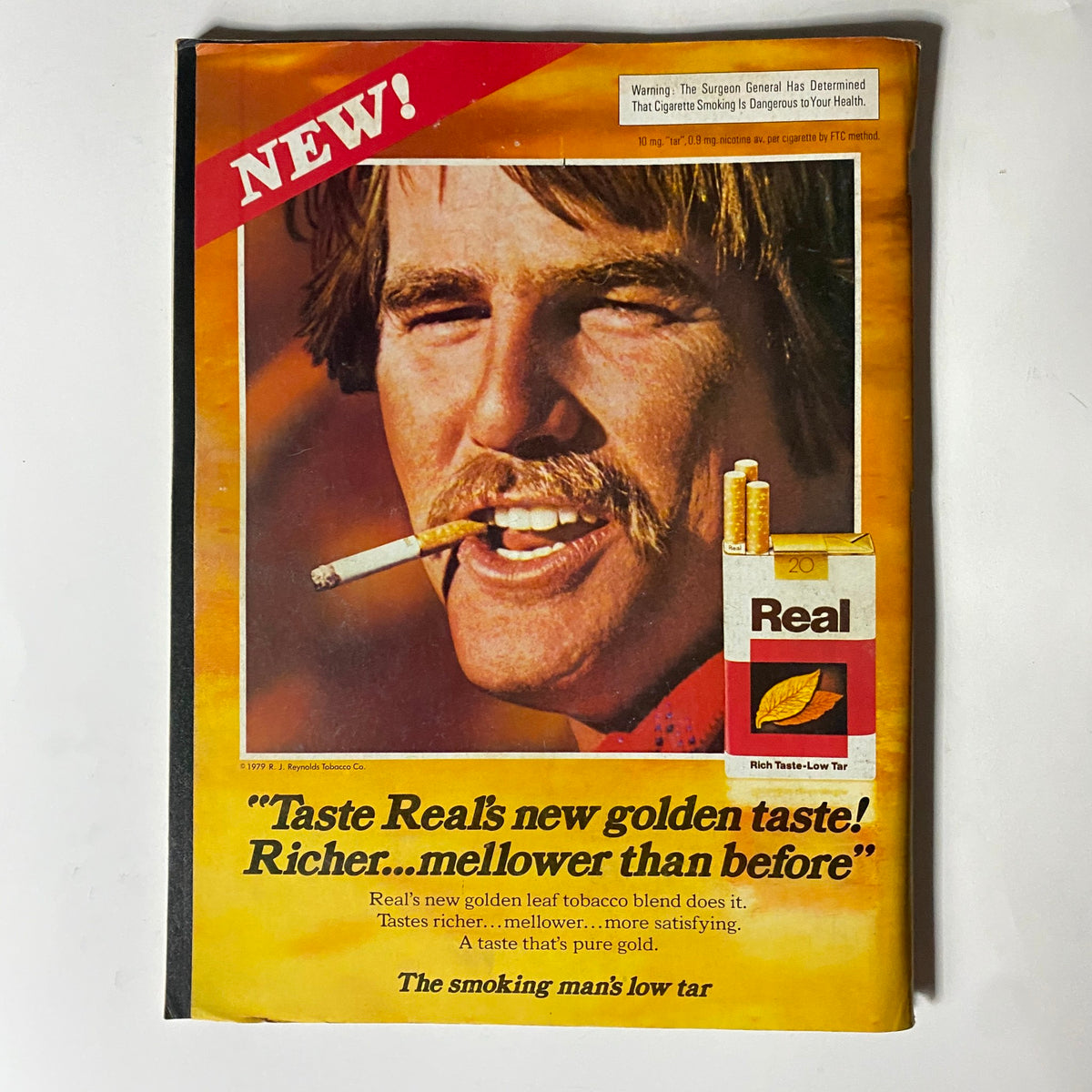 Vintage advertisement for Real cigarette in VTG Motor Trend Magazine November 1979, promoting their low tar blend.