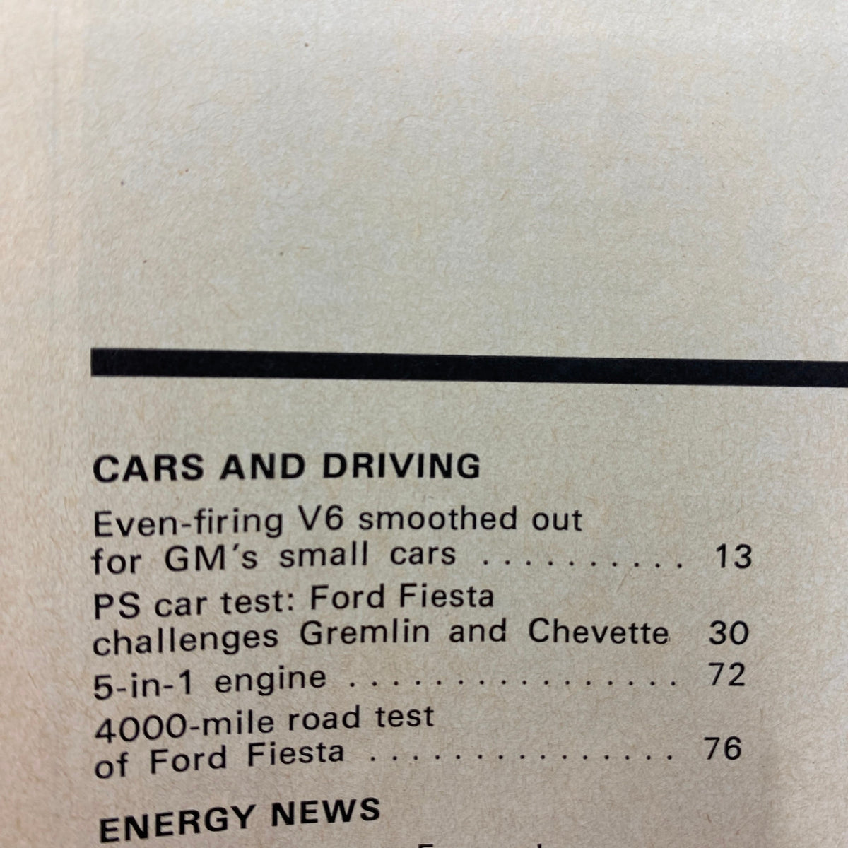 Inside page of VTG Popular Science Magazine July 1977 detailing car articles including the even-firing V6 for GM's small cars and a car test for Ford Fiesta.