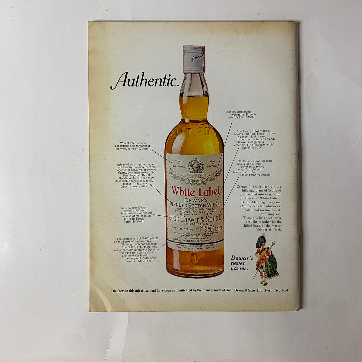 Vintage advertisement for White Label Dewar's Blended Scotch Whisky from The New Yorker Full Magazine April 22, 1972, showcasing the bottle and promotional text.