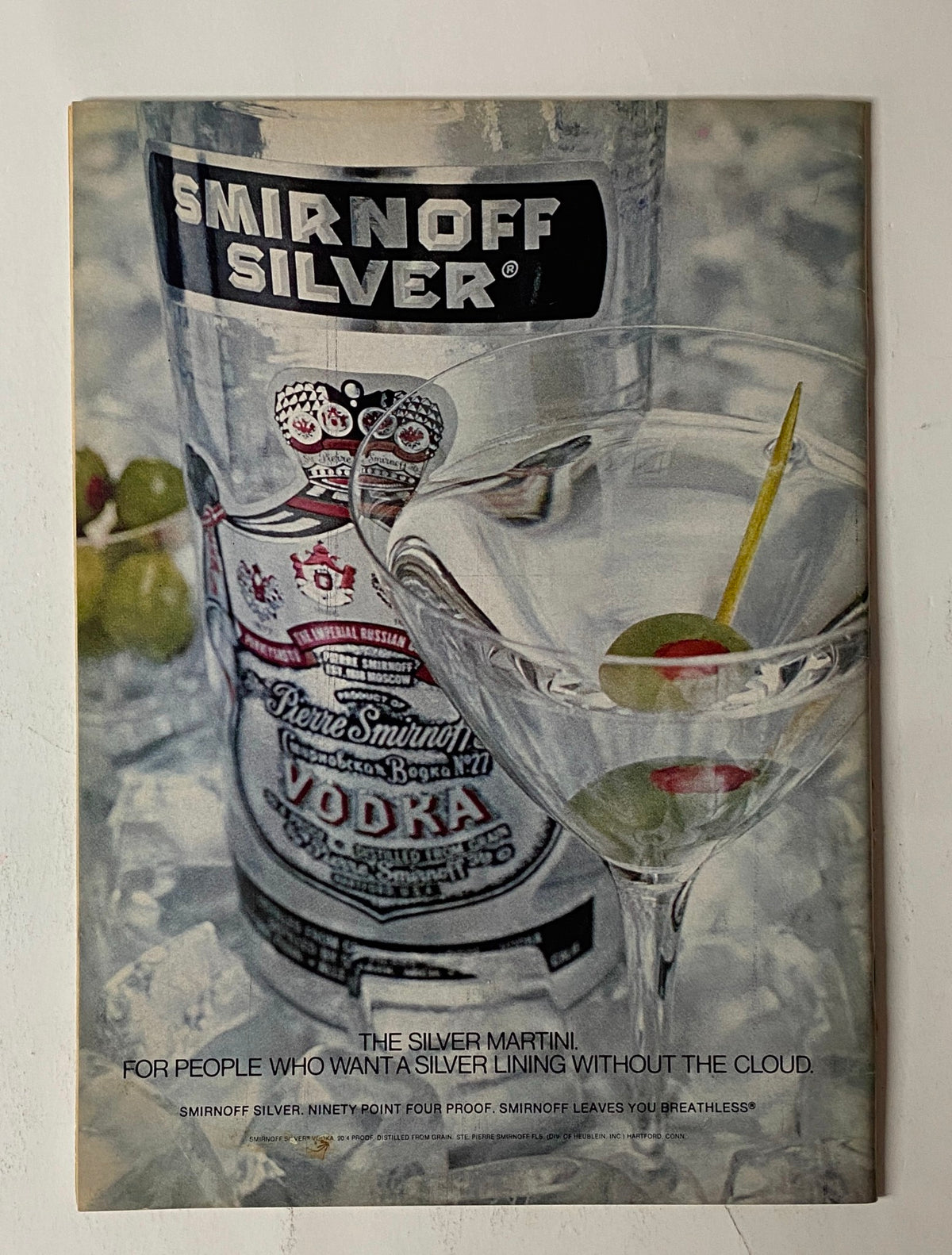 Advertisement for Smirnoff Silver vodka featured in The New Yorker Full Magazine July 28, 1975, showcasing a martini with the text about the drink's appeal.