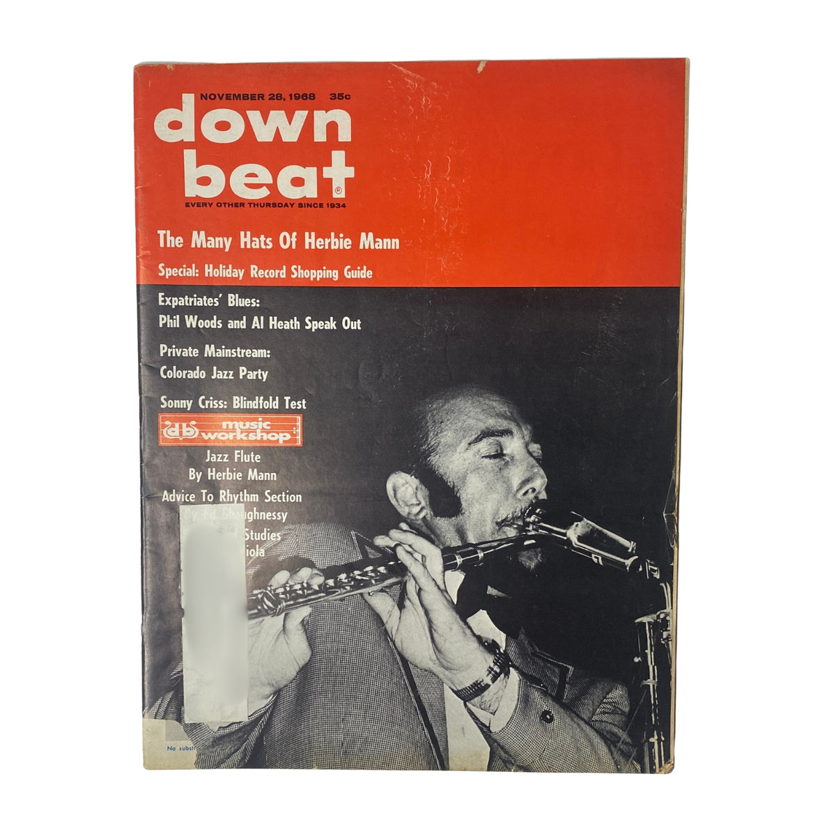 Down Beat Magazine cover from November 28, 1968, featuring Herbie Mann, highlighting articles on blues, jazz performances, and a holiday record shopping guide.
