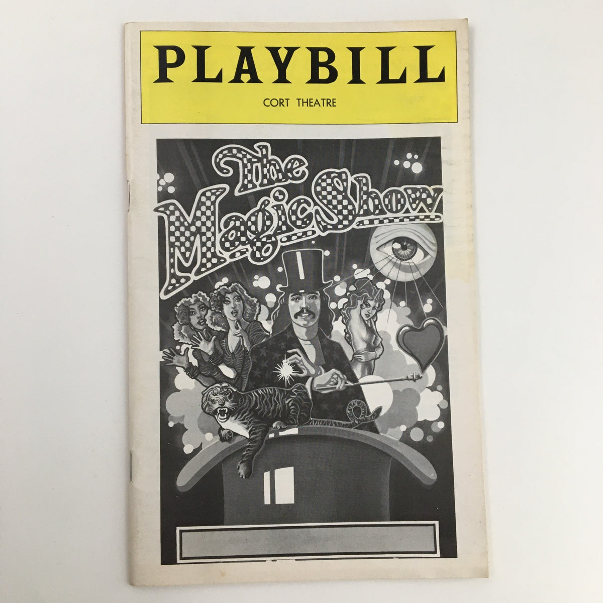 1974 Playbill for The Magic Show at Cort Theatre featuring a vintage design with theatrical elements, including performers and a tiger.