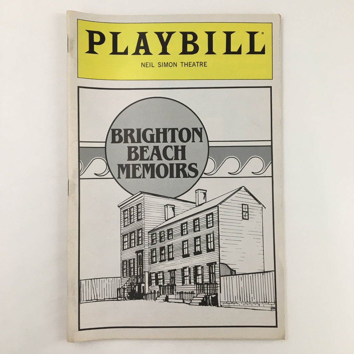 1983 Playbill for Neil Simon's Brighton Beach Memoirs featuring a cover illustration of a house and the Playbill logo from the Neil Simon Theatre.