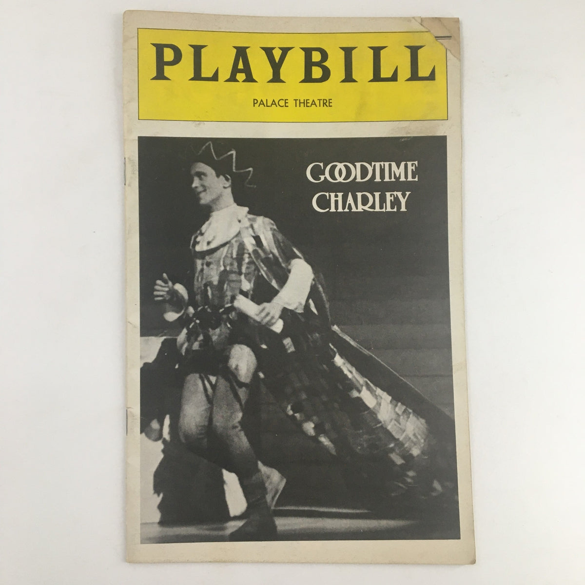 1975 Playbill from The Palace Theatre featuring Joel Grey in Goodtime Charley, showcasing a scene from the musical with a performer in costume.