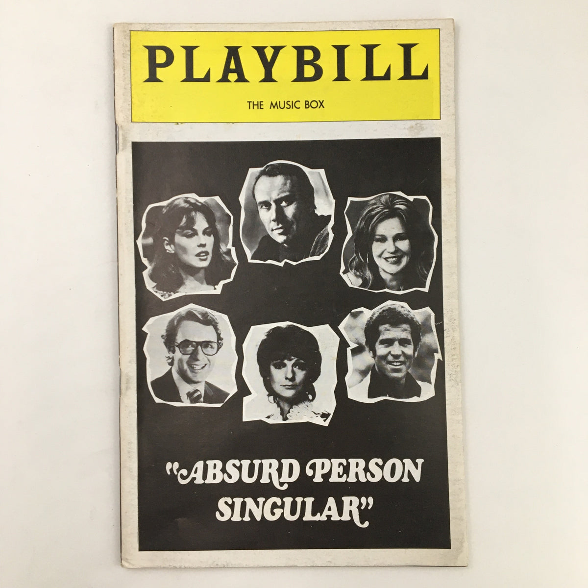 1974 Playbill for Absurd Person Singular featuring black and white portraits of the cast at The Music Box Theatre.