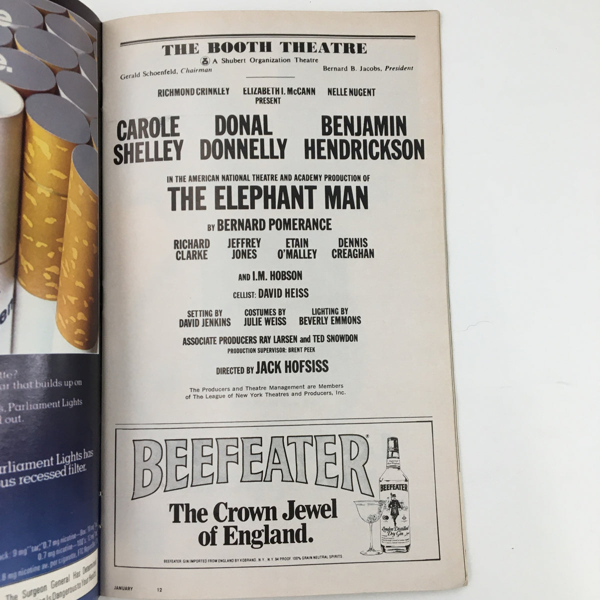 Back page of the 1981 Playbill for The Elephant Man at The Booth Theatre, displaying the cast and crew information along with an advertisement for Beefeater, showcasing the production details.