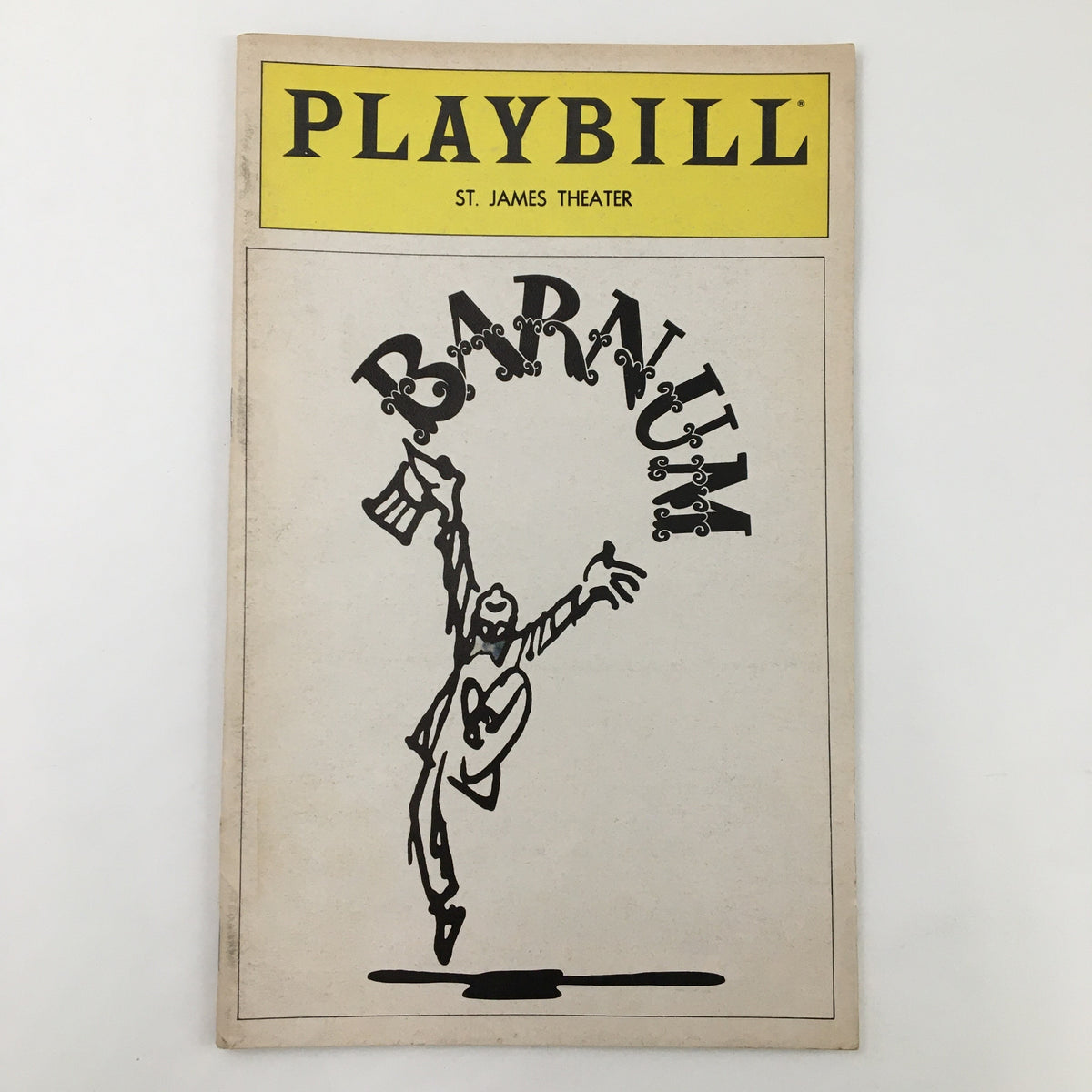 Front cover of the 1981 Playbill for St. James Theatre featuring Jim Dale in Barnum, showcasing a dancing figure and classic design.