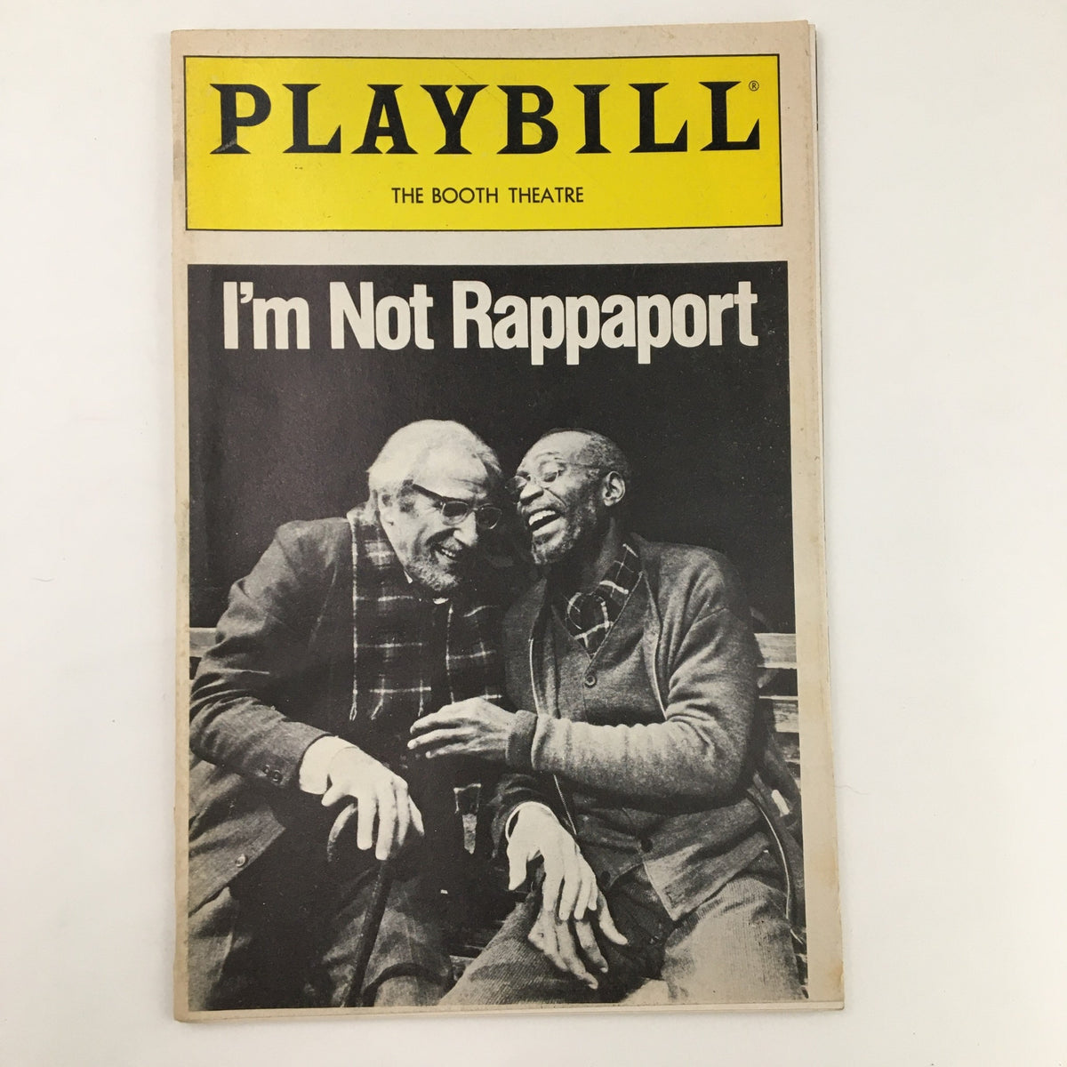 Cover of the 1986 Playbill for The Booth Theatre featuring the play 'I'm Not Rappaport' by Herb Gardner, showcasing two characters laughing.