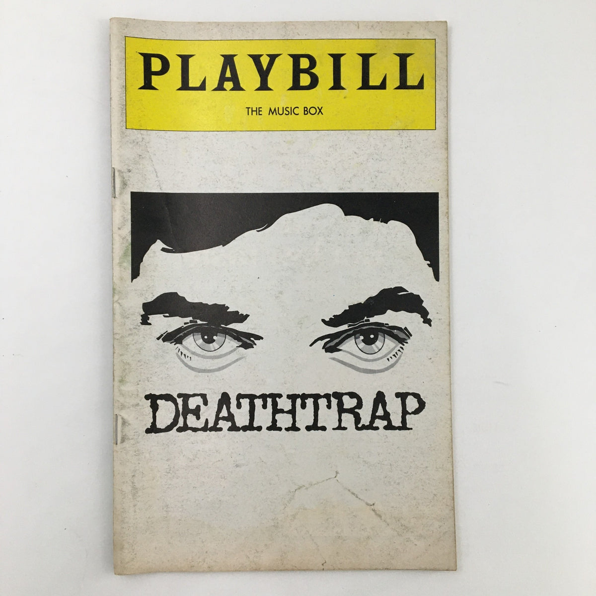 1978 Playbill for the musical Deathtrap featuring The Music Box logo, showcasing dramatic artwork with intense eyes and the title 'DEATHTRAP' prominently displayed.